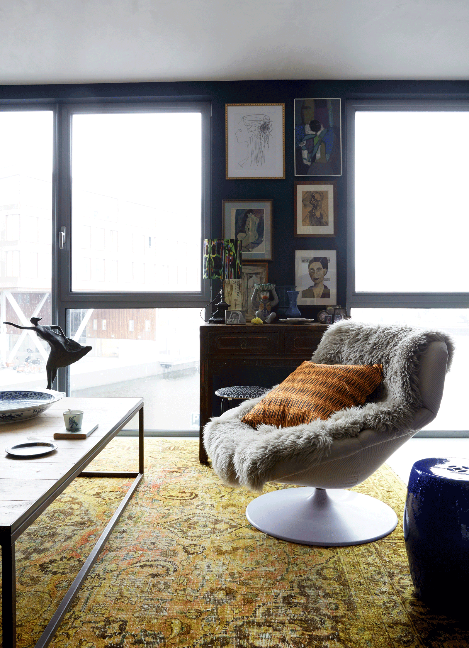 reading chair with sheepskin and cushions