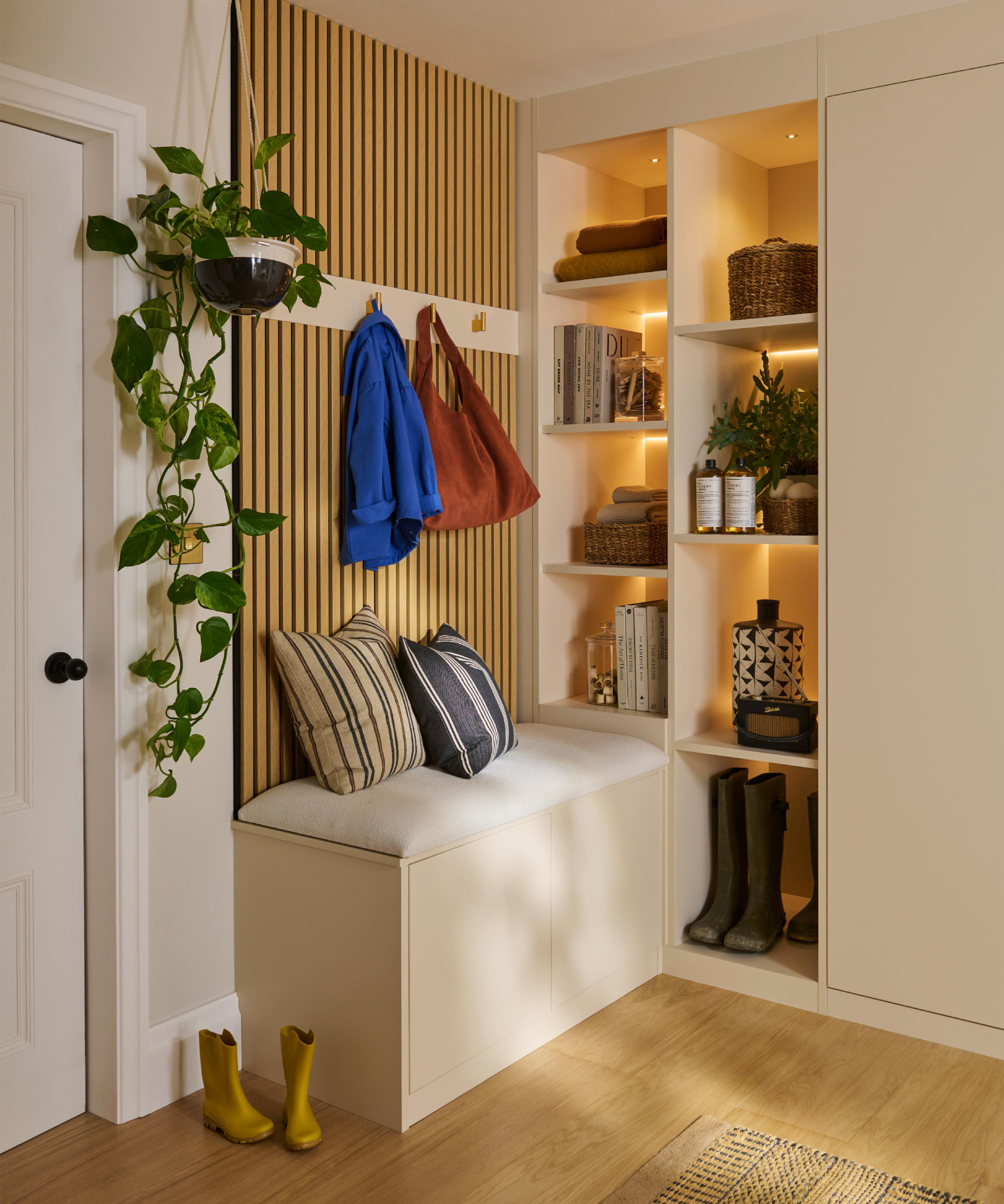 boot room area with open shelving in hallway
