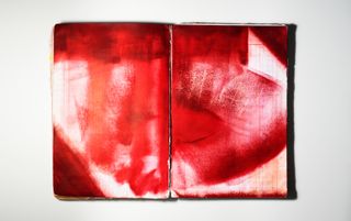 A book with pages painted in red