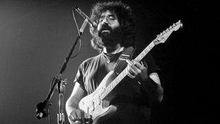 Jerry Garcia of The Grateful Dead performs on stage at the Tivoli Concert Hall in April 1972 in Copenhagen, Denmark