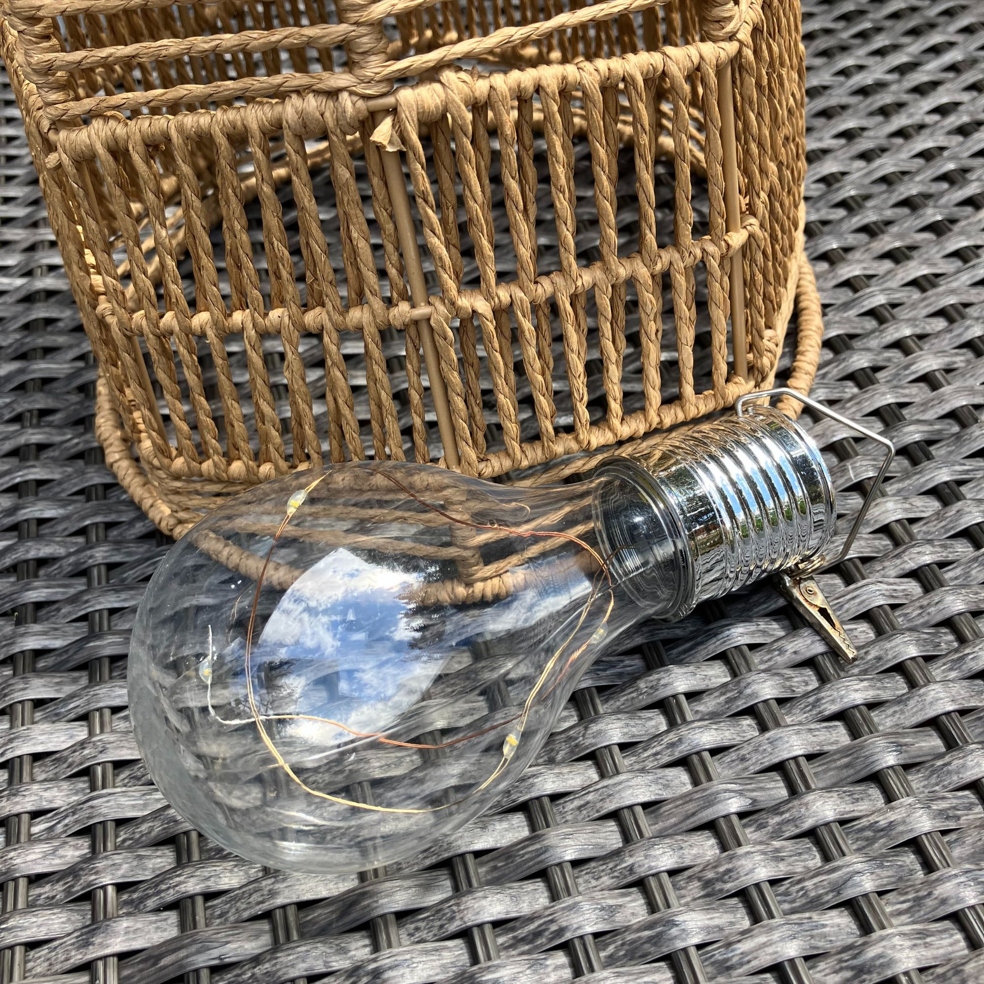 outdoor woven hanging light with solar bulb
