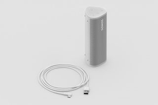 Speaker with white USB cable