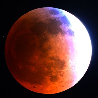 The moon turns blood red at 3 a.m. ET during the total lunar eclipse of April 15, 2014. This view was taken by astronomer Adam Block at the Mt. Lemmon SkyCenter located at Steward Observatory atop Mt. Lemmon in Arizona.
