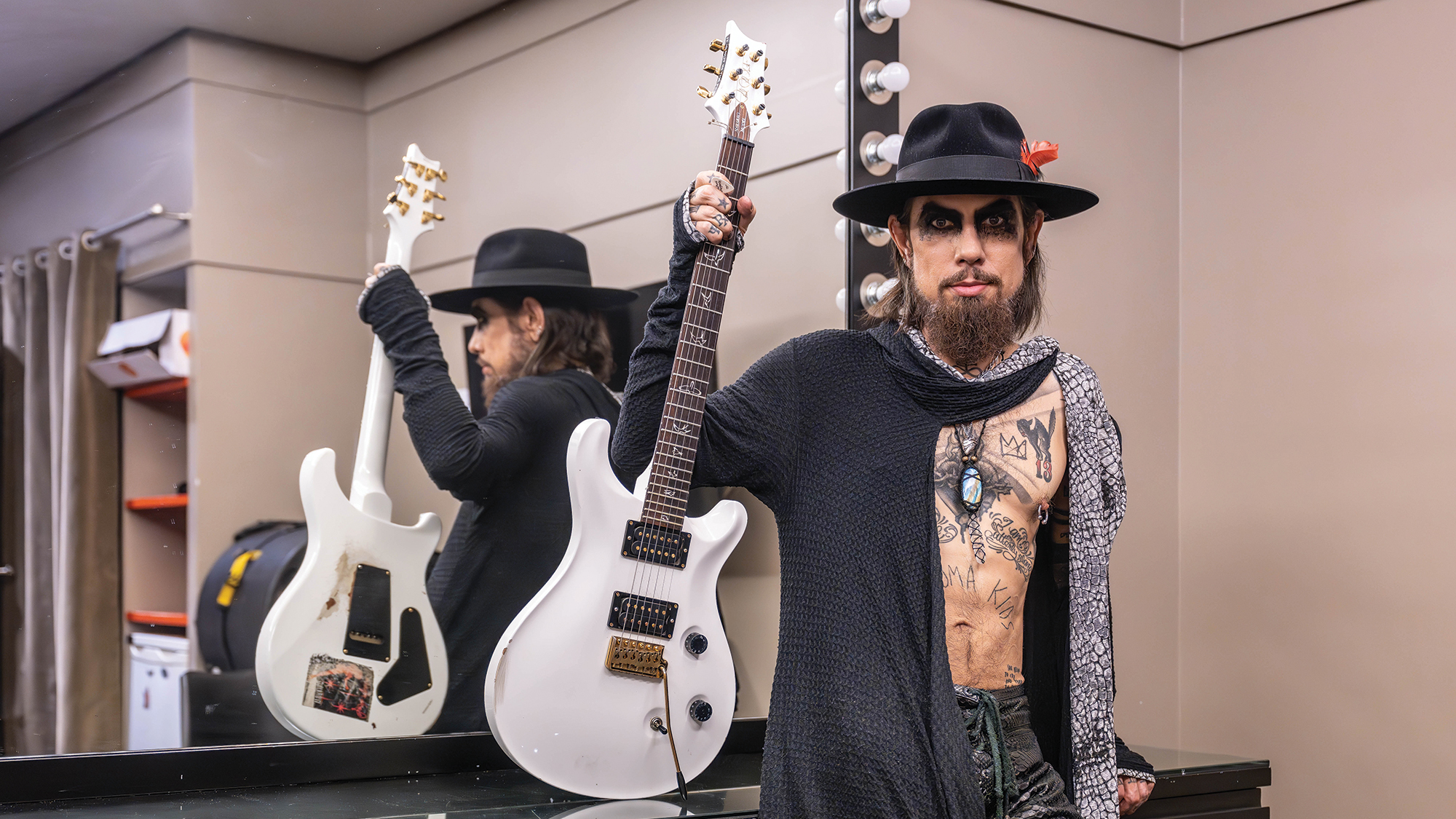 Dave Navarro poses with his Jet White PRS Dave Navarro Signature Custom 24 backstage at L’Olympia in Paris, prior to Jane’s Addiction’s show, June 26, 2024.