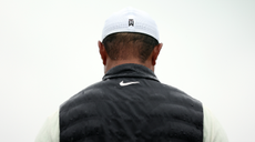 Tiger Woods' head and shoulders from behind