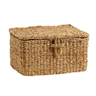 A storage basket for a guest bathroom