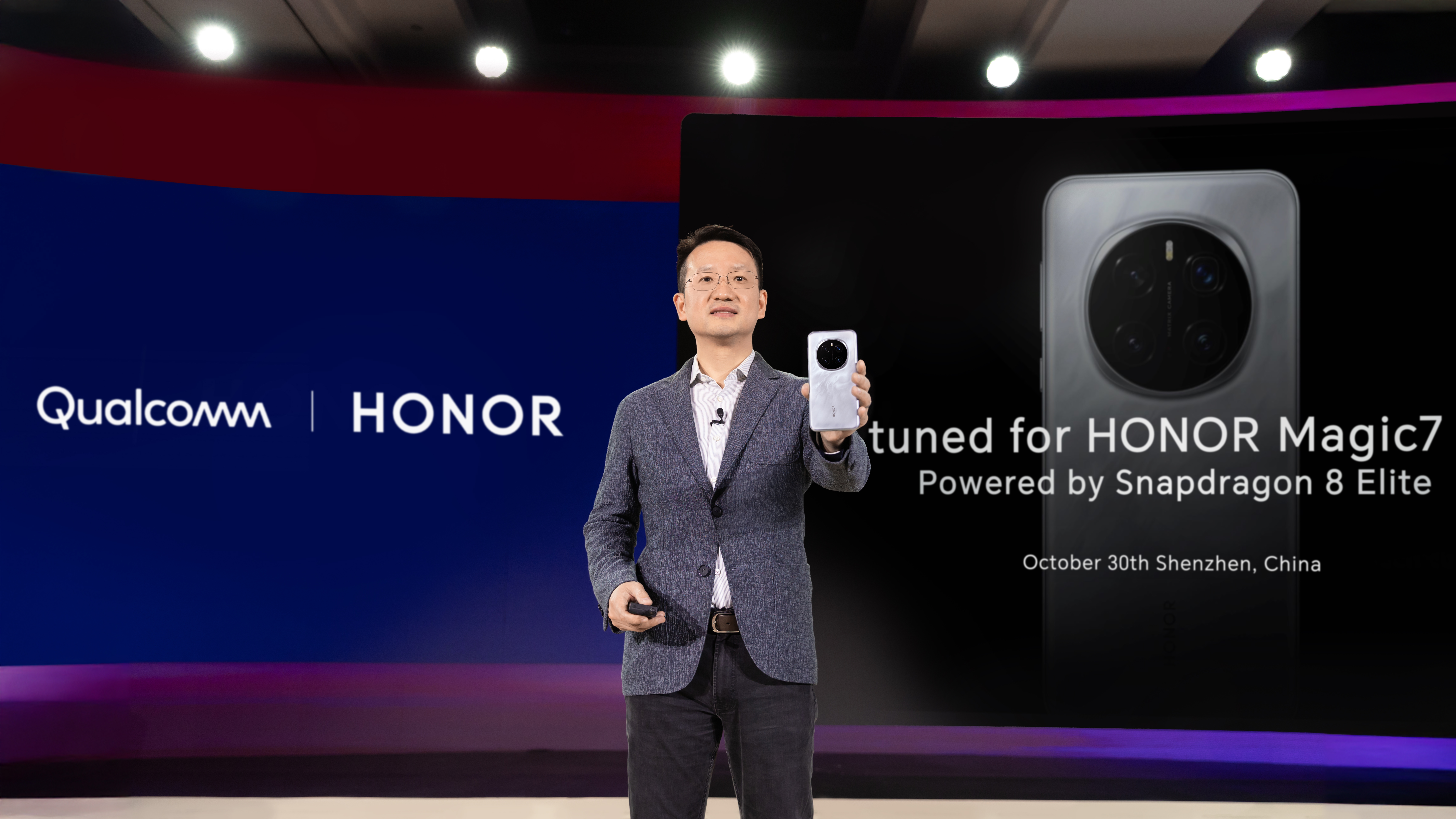 Honor CMO Ray Guo unveils Honor Magic 7 Pro on stage at Snapdragon Summit