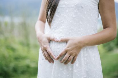 pregnant bridesmaid