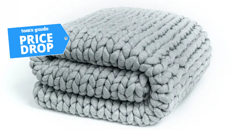 Helix blue knit weighted blanket folded against a white background