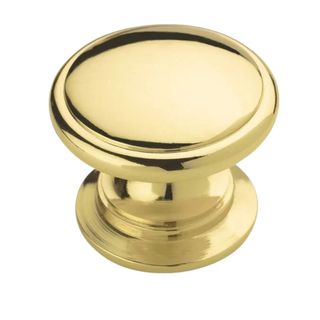 A polished brass knob