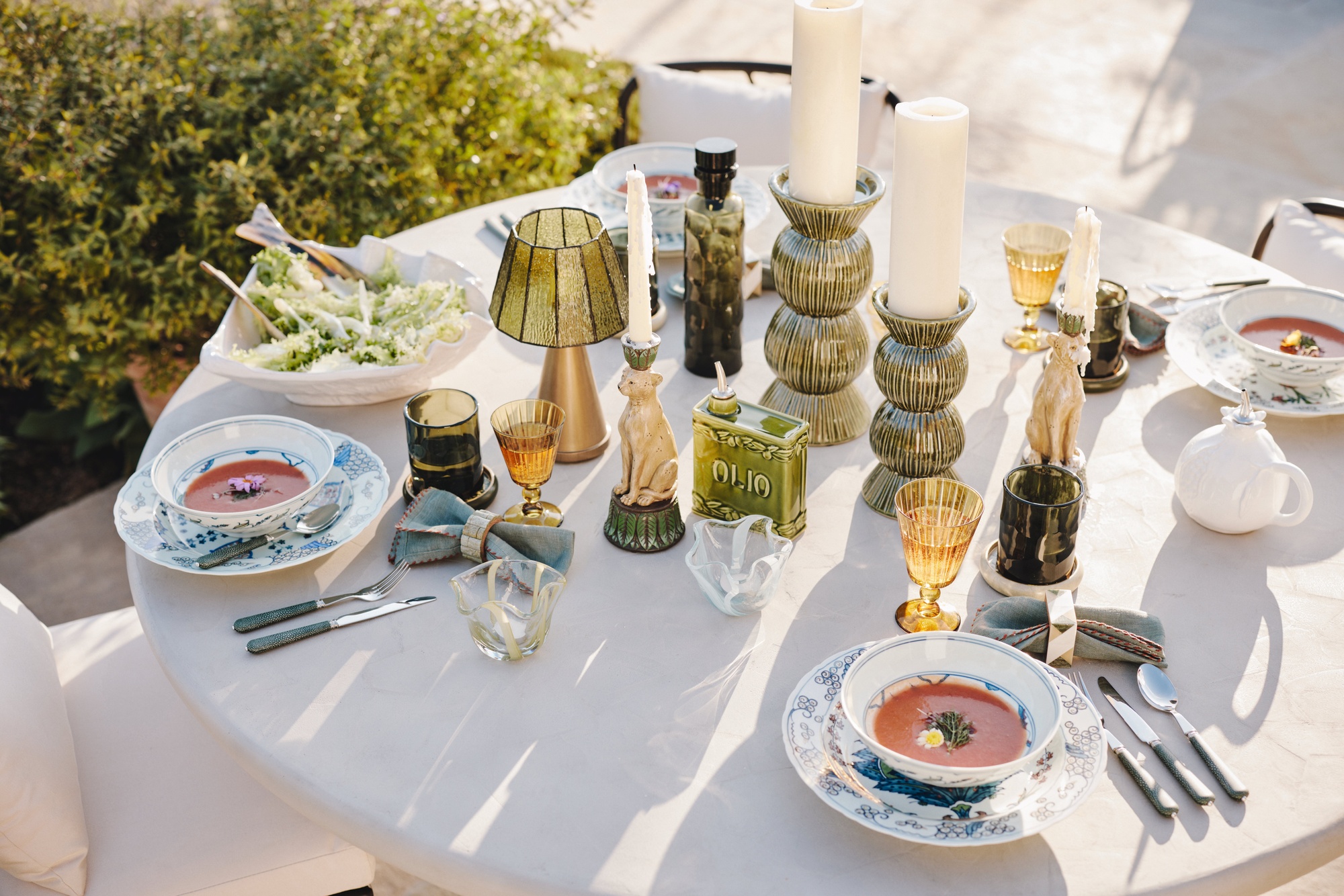 outdoor dining table with colourful serveware