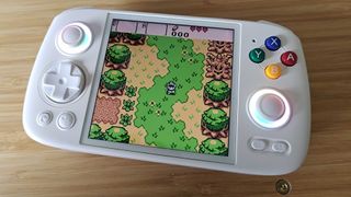 Anbernic RG Cube with Zelda: Oracle of Seasons gameplay on screen