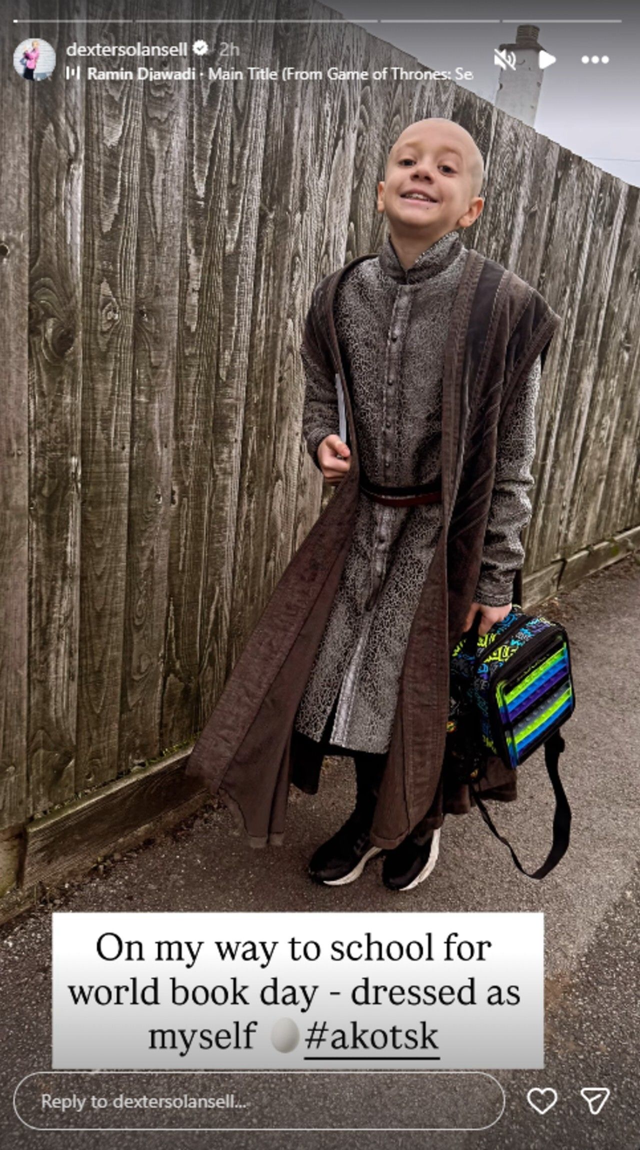 Dexter Sol Ansell with his lunchbox on his way to school