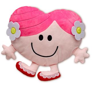 soft toy in pink with red shoe and white flower on head