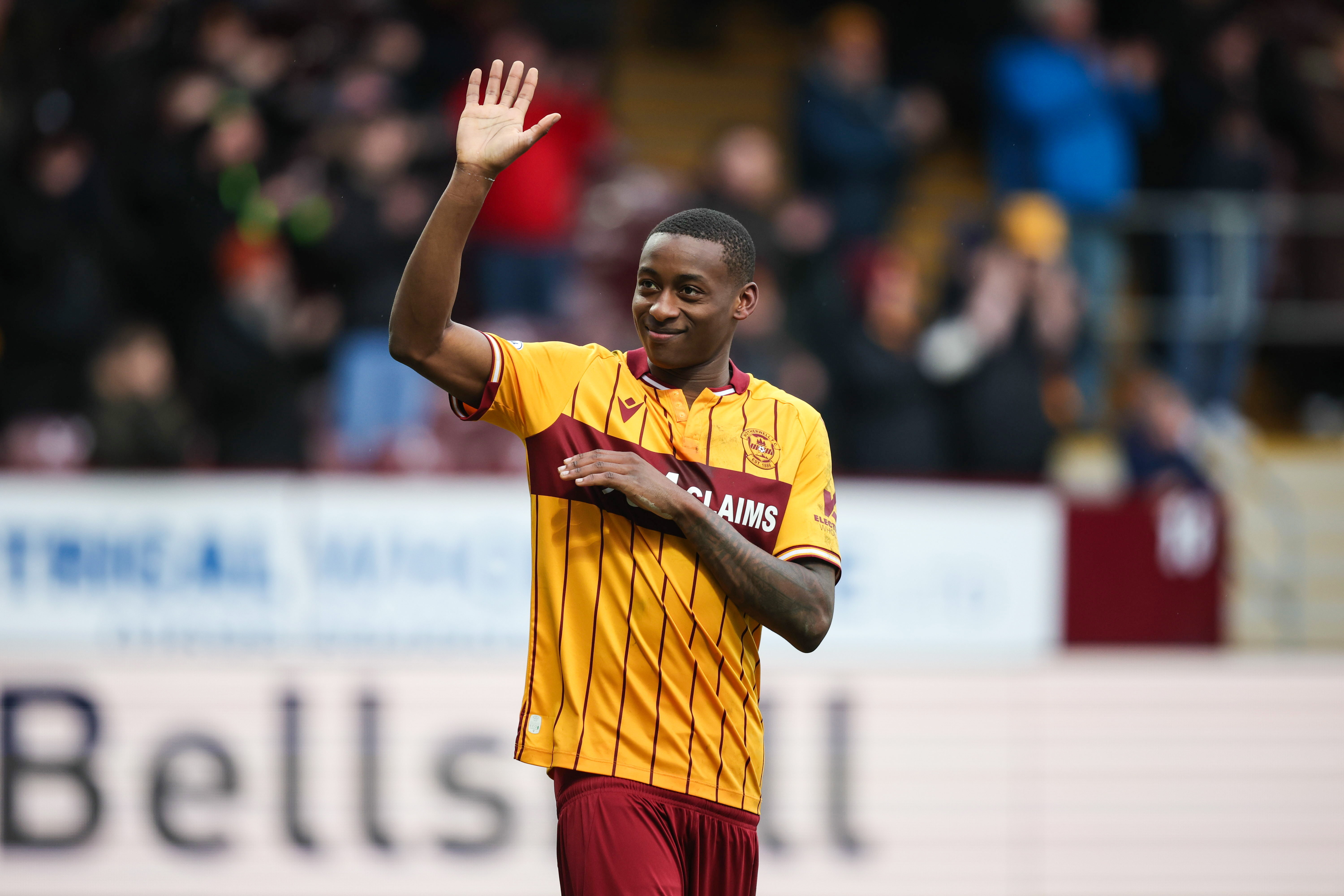 Tawanda Maswanhise waving