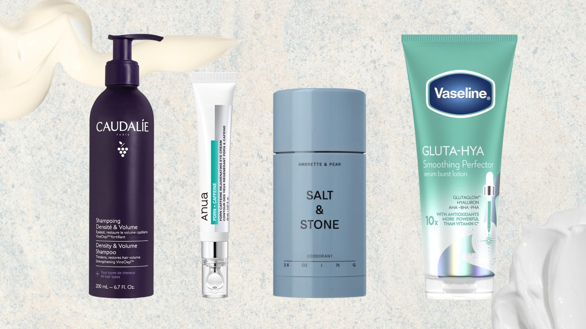 Lineup of new beauty launches under &pound;20 (L-R) from Caudalie, Anua, Salt and Stone and Vaseline, on a blue speckled background with cream swatches