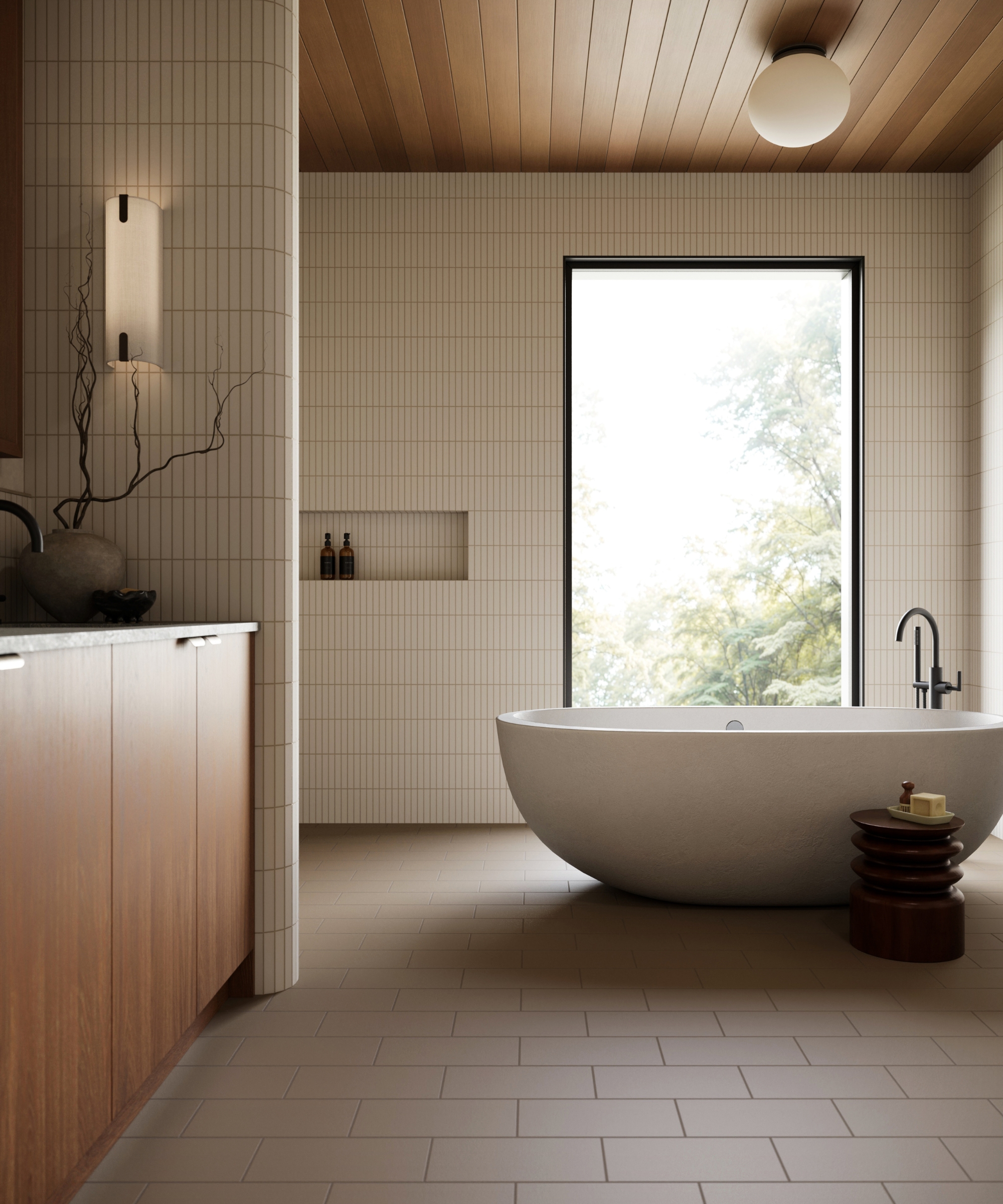 A large wet room with tiled walls and floors, a wood vanity, wood paneled ceilings and a large white freestanding bath