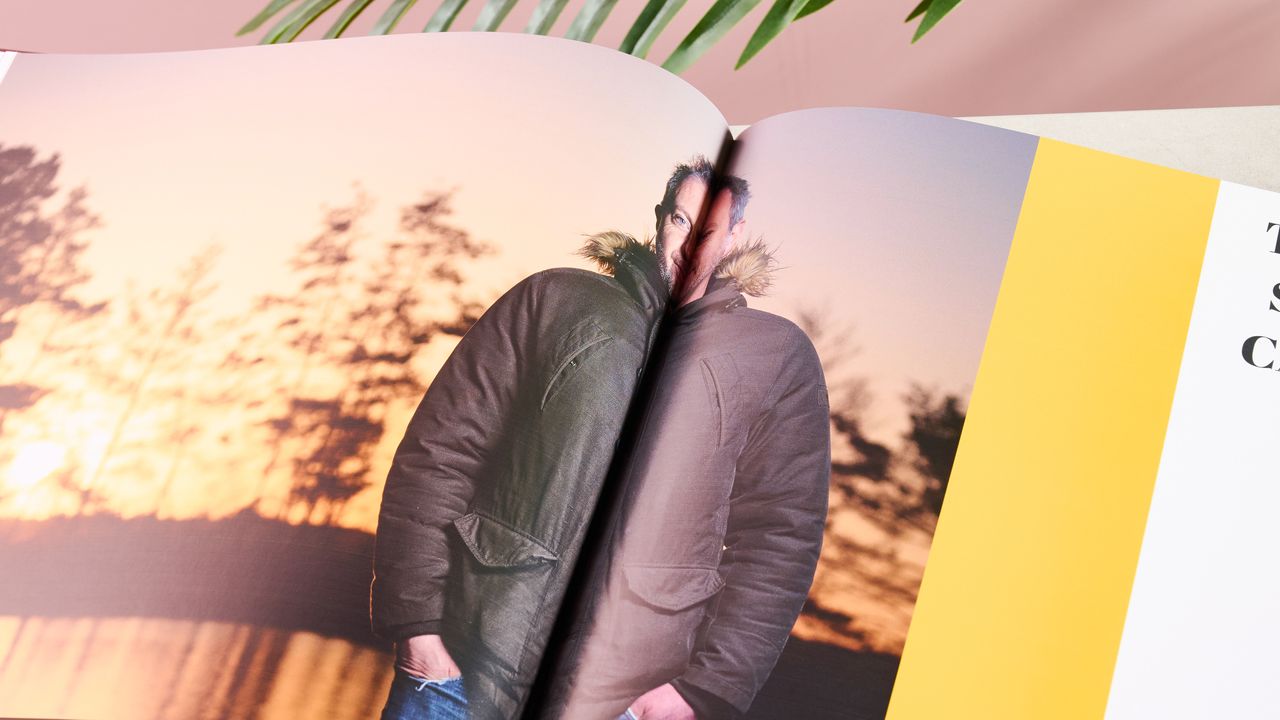 Page spread showing man with hands in his pockets in Printerpix photo book