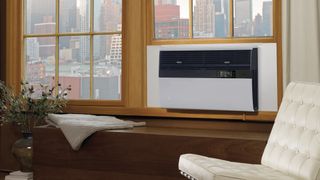 Kuhl Q smart air conditioner installed in a window.