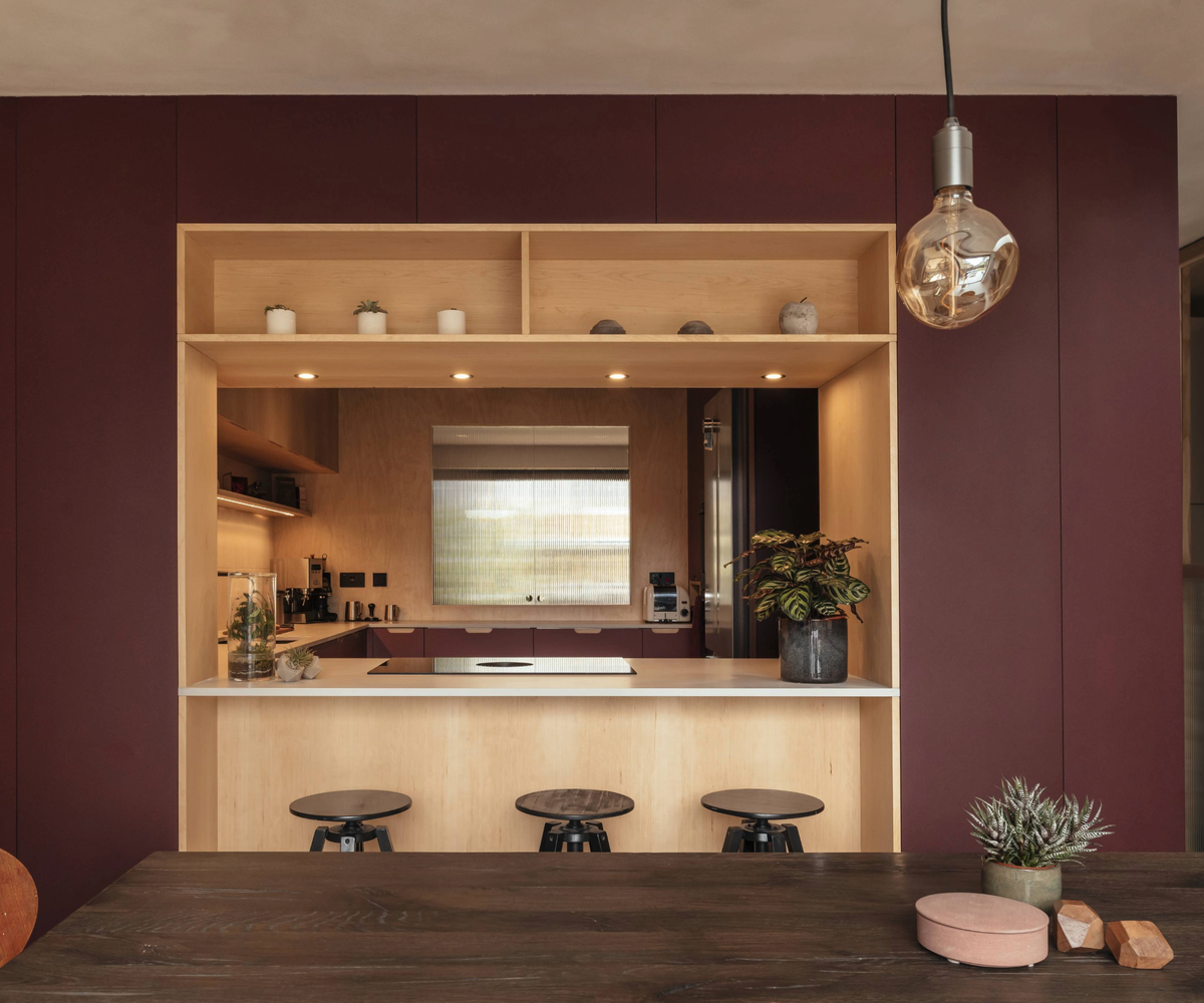 View into the kitchen hatch from the dining table