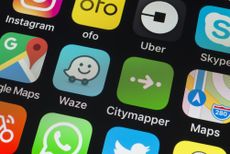 A number of transport and map apps on an iPhone