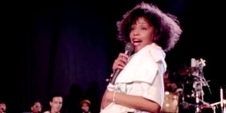 Archival footage of Whitney Houston performing in Whitney