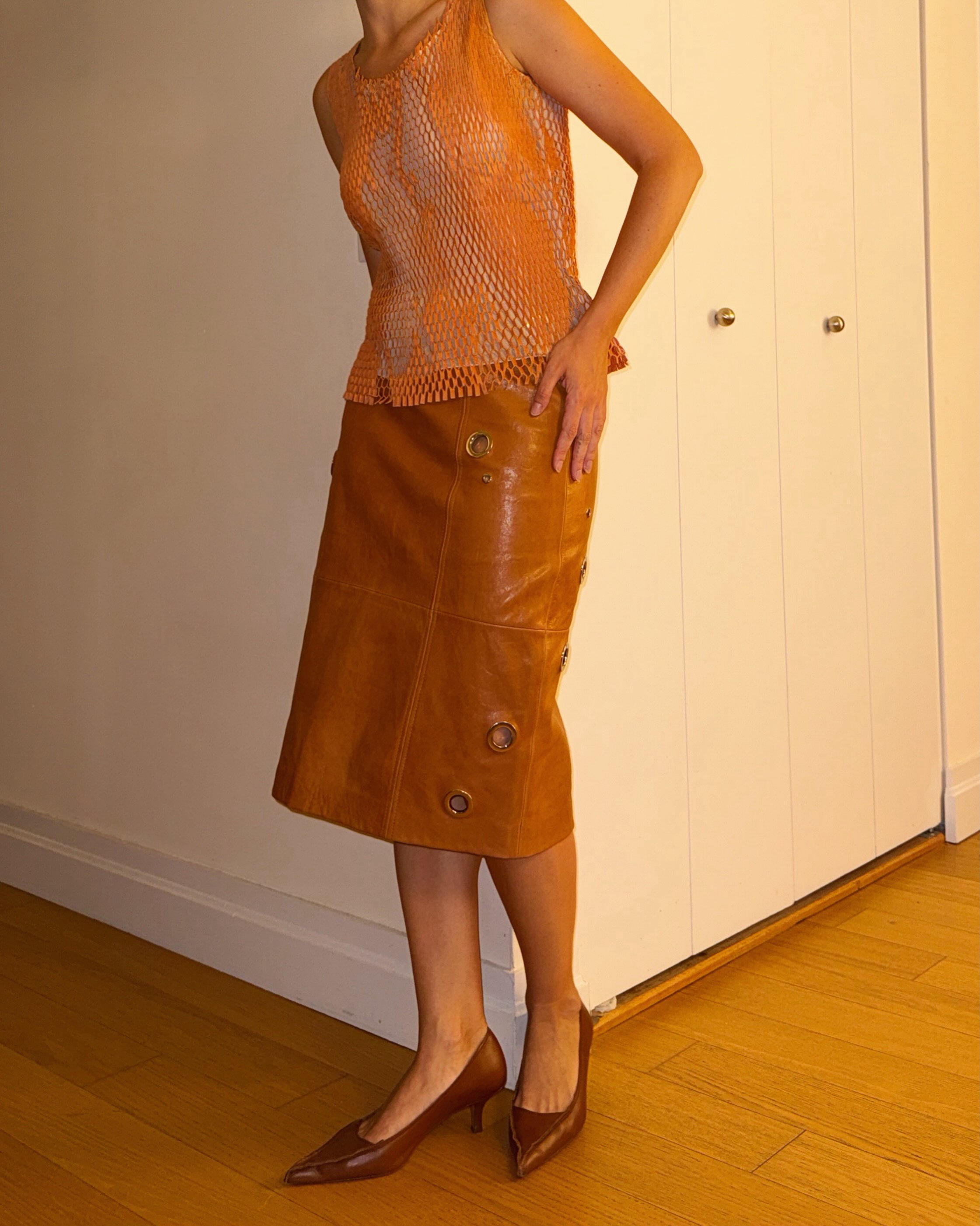 An image of a woman wearing best statement fall skirt 2026