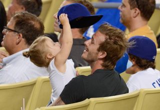 David Beckham - Harper Beckham - baseball game - Marie Claire - Marie Claire UK