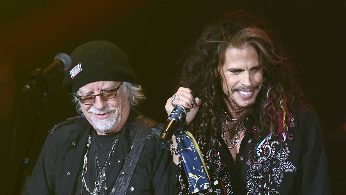 Brad Whitford and Steven Tyler onstage