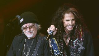 Brad Whitford and Steven Tyler onstage