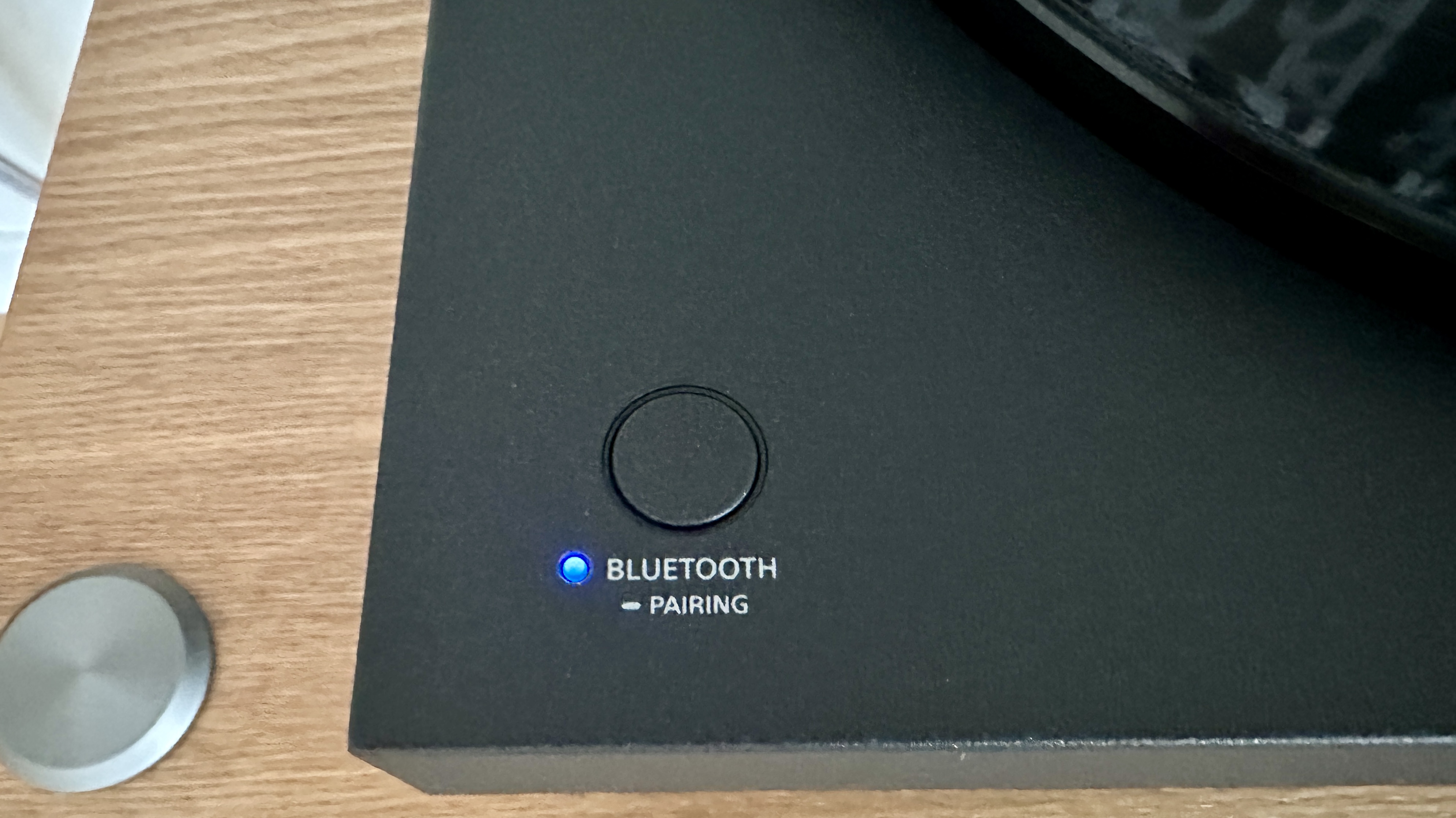 Sony PS-LX510BT turntable on a brown wood hi-fi rack, with closeups