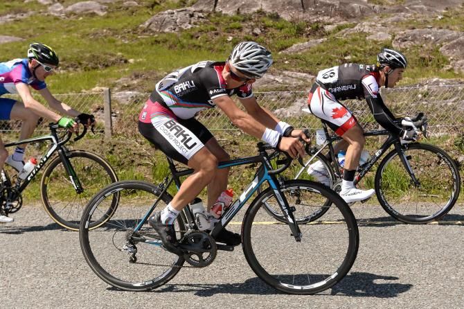 Krill Pozdnyakov (Synergy Baku) checks the gap to the chasing group