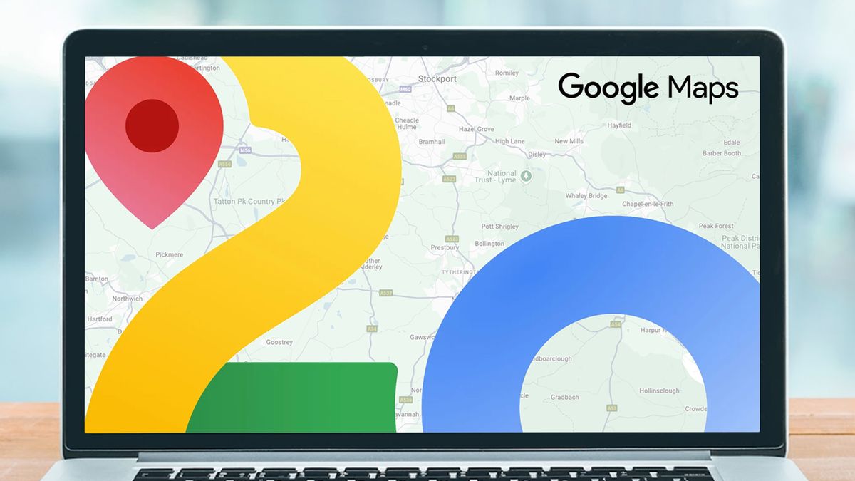 A Google Maps 20th birthday screen on a laptop sitting on a table