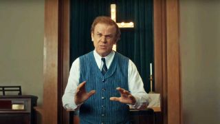 John C. Reilly in the video for Archbishop Harold Holmes