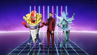Joel Dommett on stage with Sausage and Seahorse for The Masked Singer 2021