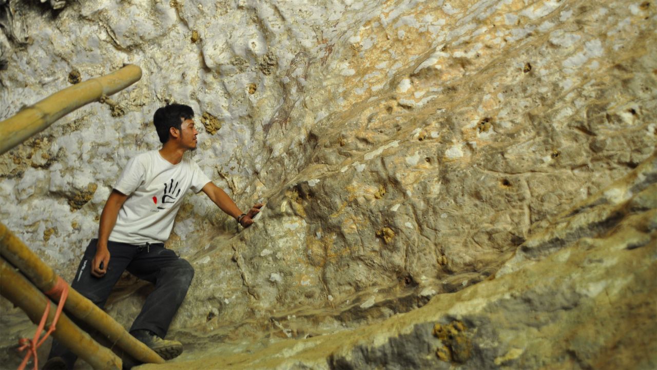 The panel of cave art found in Sulawesi shows what may be half-human, half-animal beings called therianthropes.