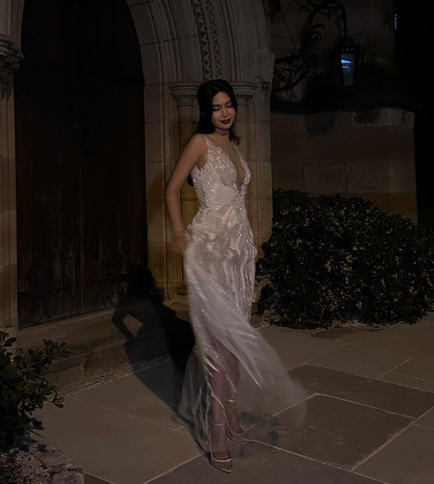Mishti Rahman wears a Paolo Sebastian Dress and tousled curls