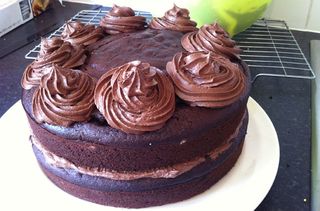 decorating a chocolate cola cake