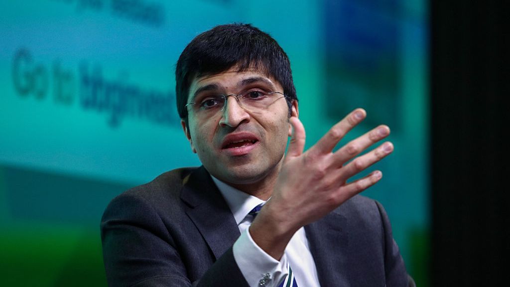 Nikhil Rathi, Chief Executive of the Financial Conduct Authority, gestures with his right hand while talking at a conference