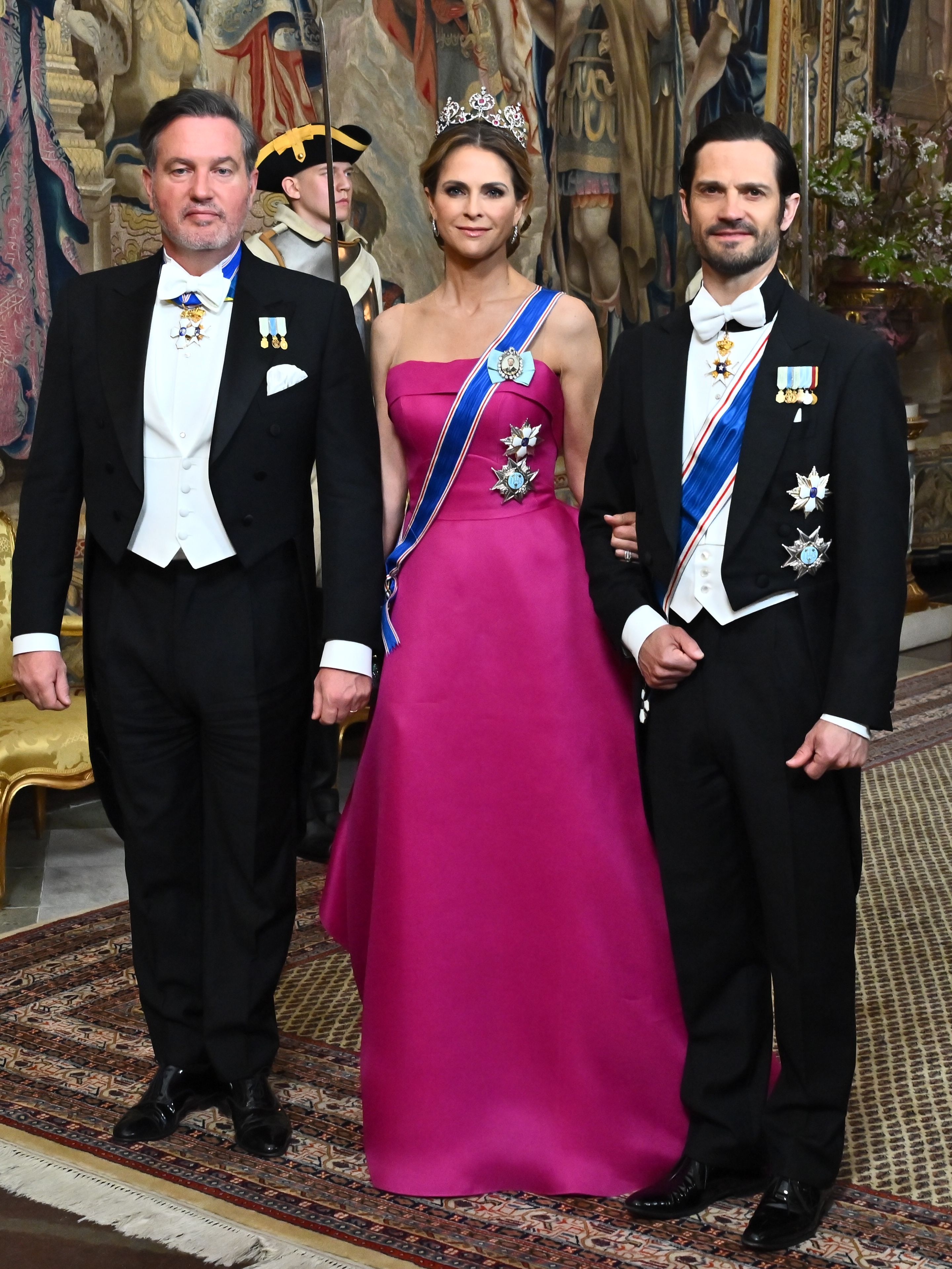 Chris O'Neill, Princess Madeleine and Prince Carl Philip at a state banquet in Sweden