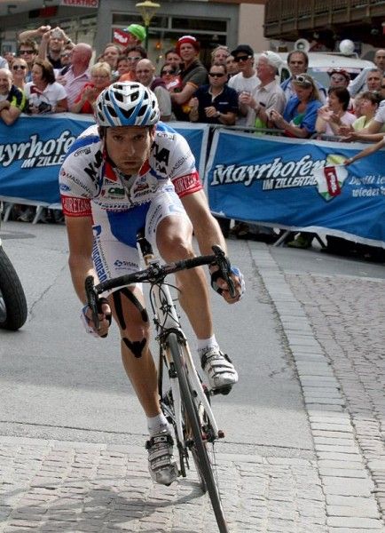 Michele Scarponi (Diquigiovanni - Androni) on the streets of Mayrhofen, Austria with one kilometre remaining.