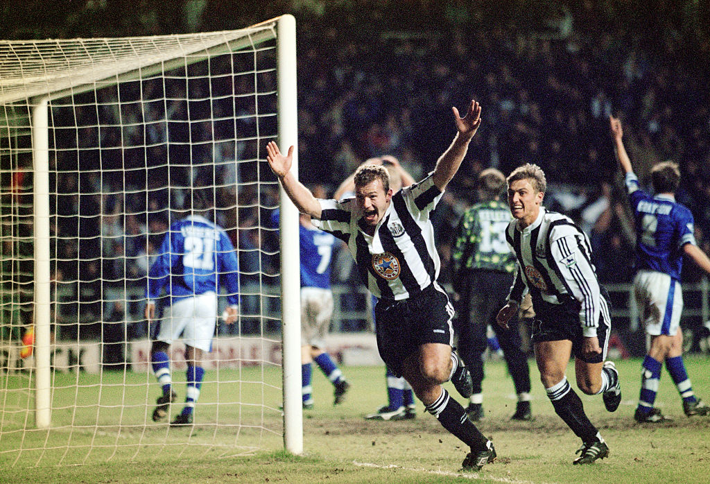 Newcastle United striker Alan Shearer celebrates with Lee Clark (r) after completing his hat trick and a 4-3 FA Premier League win for Newcastle after being 3-1 behind to Leicester City at St Jame's Park on February 2, 1997 in Newcastle, England