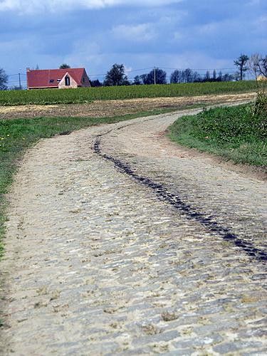 The Paris-Roubaix cobbles already took its toll on the oil pan of a passing vehicle.