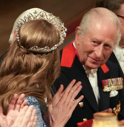 Princess Kate wearing a tiara and blue evening gown
