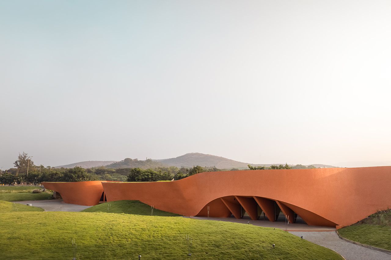 exterior of low curved volumes at Hampi Art Labs