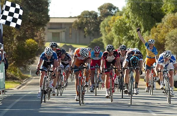 Steele Von Hoff (2nd from left) of Genesys Wealth Advisers holds out Ben Kersten (Swan Hill Heart of the Murray) and Philip Grenfell (Bikebug.com) to win stage twelve.