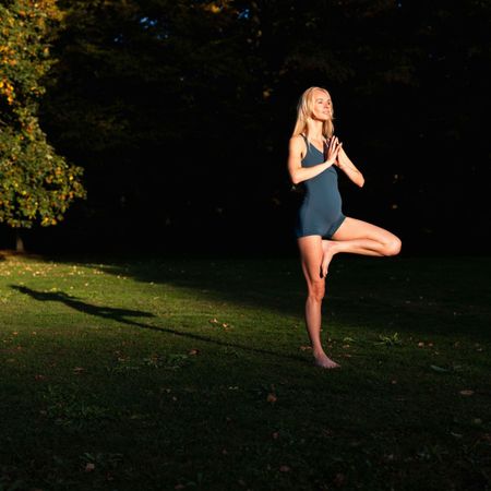 Woman meditating in the garden