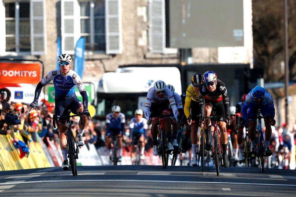 ORLEANS FRANCE MARCH 07 Fabio Jakobsen of Netherlands and Team QuickStep Alpha Vinyl celebrates winning ahead of Wout Van Aert of Belgium and Team Jumbo Visma and Christophe Laporte of France and Team Jumbo Visma yellow leader jersey during the 80th Paris Nice 2022 Stage 2 a 1592km stage from Auffargis to Orlans ParisNice on March 07 2022 in Orleans France Photo by Bas CzerwinskiGetty Images