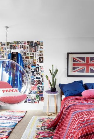 Teenager's bedroom with photo wall and bubble swing chair