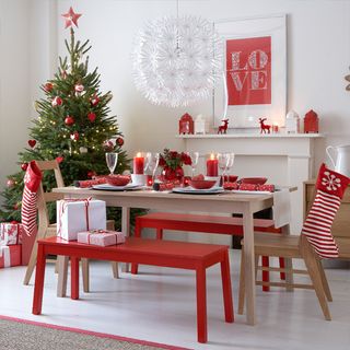 christmas tree with bench seating and candles
